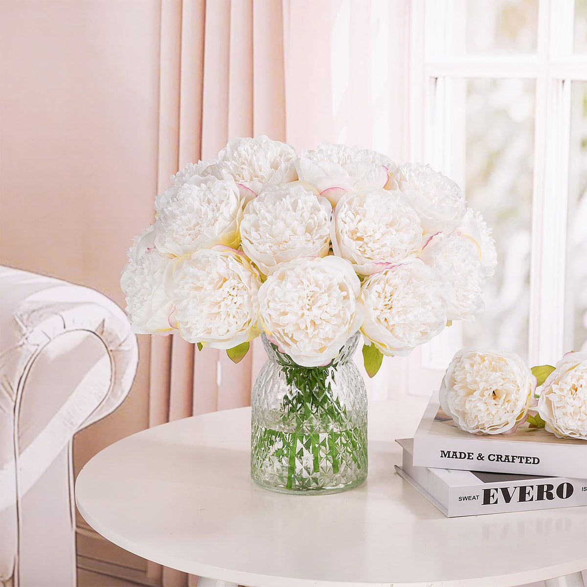 U'Artlines wedding decor with cream peonies for soft focal points.