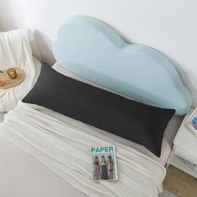 Ubauba long body pillow on bed delivers supportive alignment for side and back sleepers.