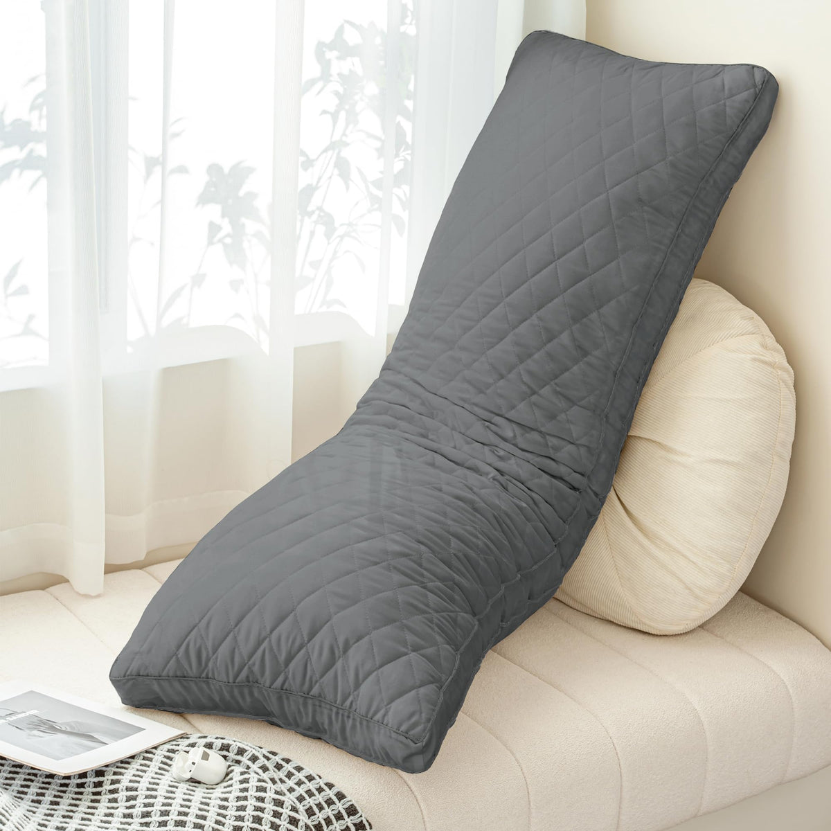 Ubauba Memory Foam Body Pillow features shredded memory foam fill for responsive loft.