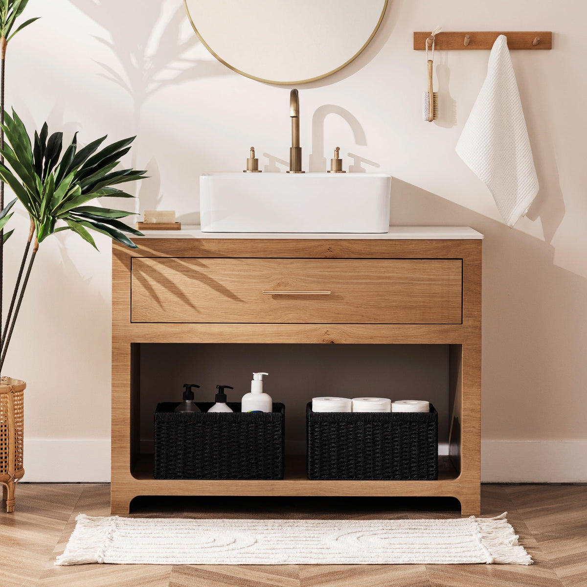 UBBCARE wicker basket in black complements nursery or living space.