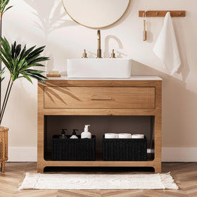 UBBCARE wicker basket in black complements nursery or living space.