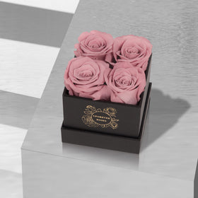 Silk ribbon accent on UFOREVER ROSES packaging enhances premium presentation for celebrations