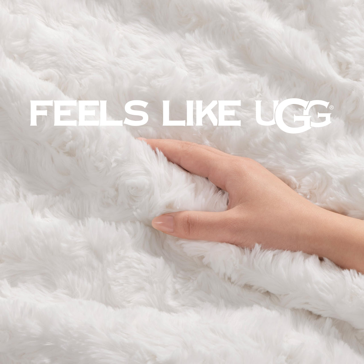 UGG Adalee white faux fur throw enhances sofa decor in living room