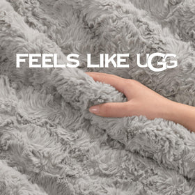UGG Adalee faux fur throw draped over a chair adds plush style