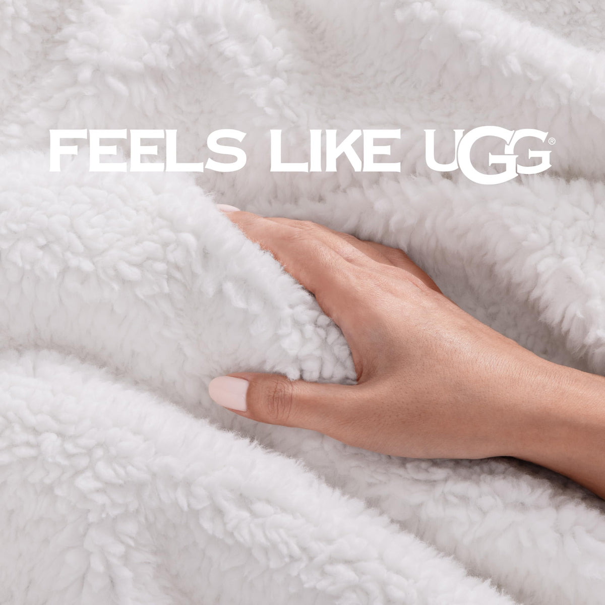 UGG Bliss Throw Blanket charcoal grey tone enhances room decor.
