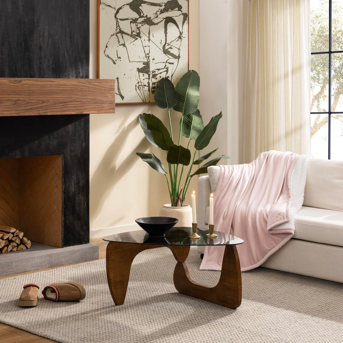 UGG Bliss Throw Blanket folded neatly highlights compact warmth for cozy spaces.