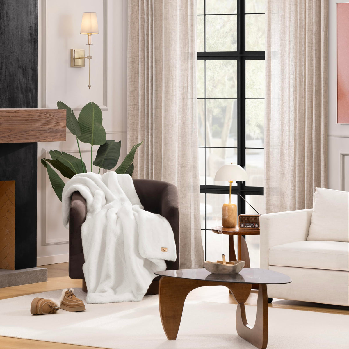 UGG Euphoria Faux Fur Throw back texture provides soft backing