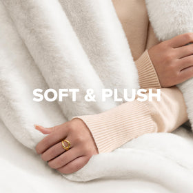 UGG Euphoria Faux Fur Throw White Snow color enhances decor