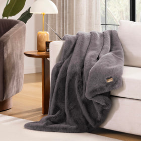 UGG Euphoria machine washable throw stays plush after washing.