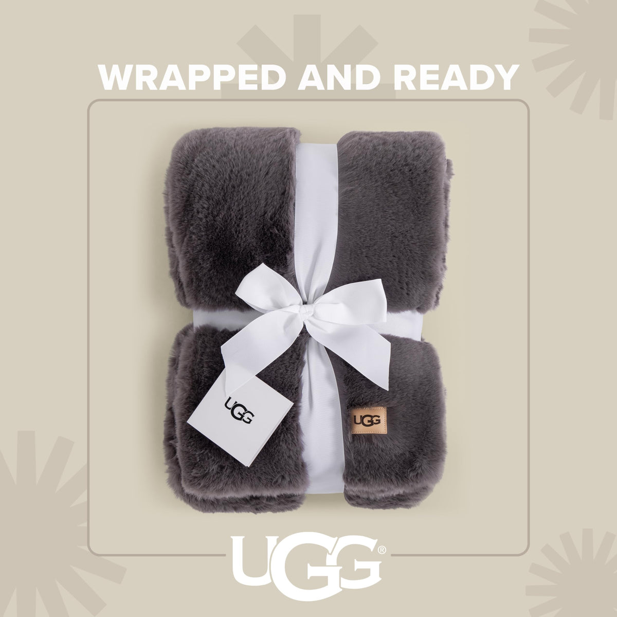 UGG Euphoria oversized 50x70 throw draped over sofa for luxurious lounging.