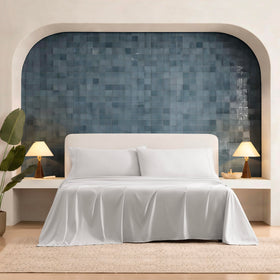 UGG Hedi king flat sheet 112x104 demonstrates generous sizing for a secure fit.