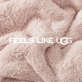 UGG Whitecap throw measures 50x70 inches for versatile use.