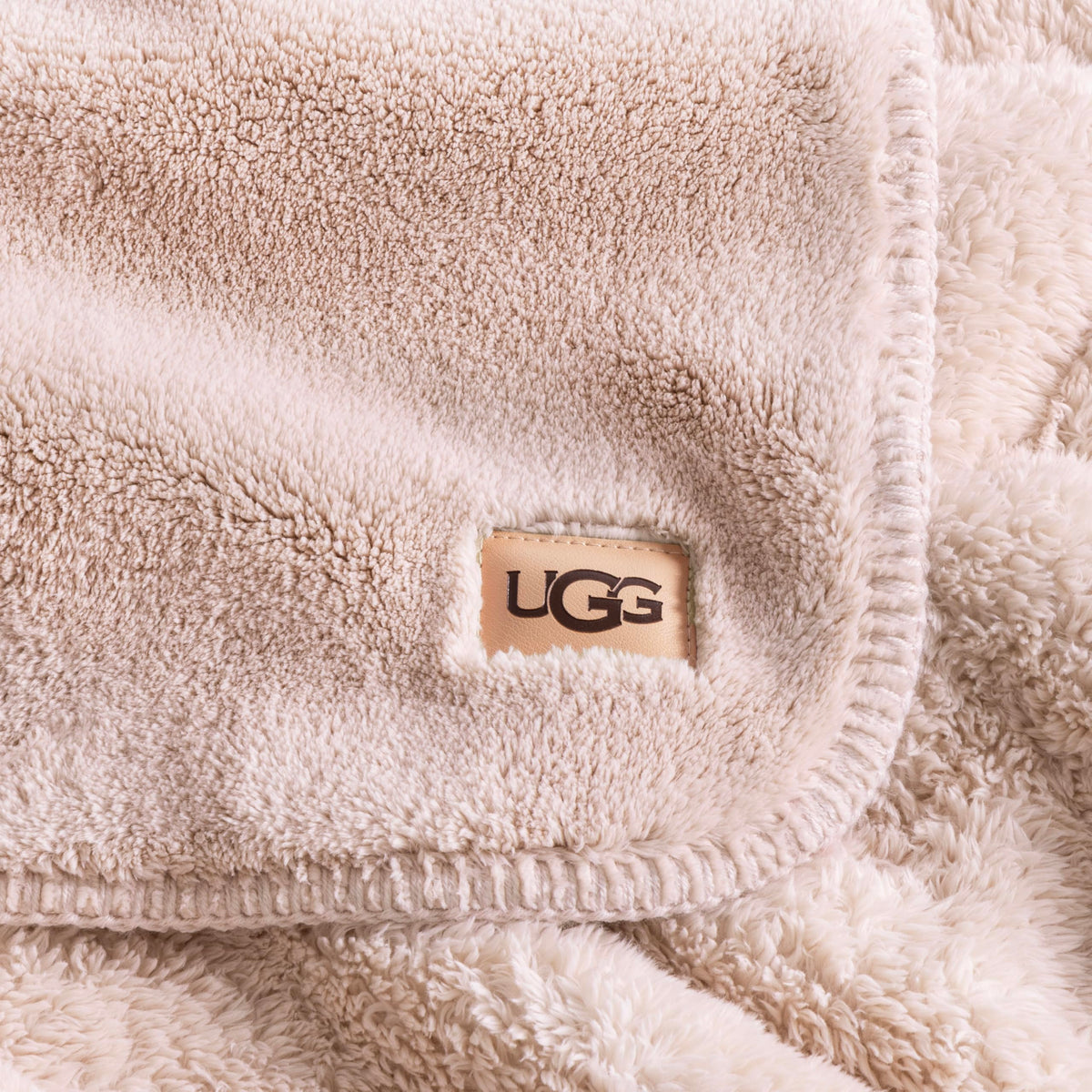 UGG Whitecap throw machine washable for easy care and maintenance.