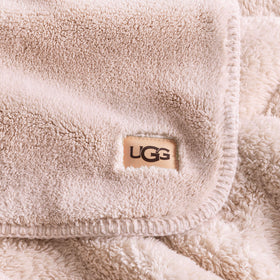 UGG Whitecap throw machine washable for easy care and maintenance.