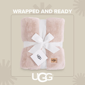 UGG Whitecap throw plush fleece texture ideal for couch relaxation.