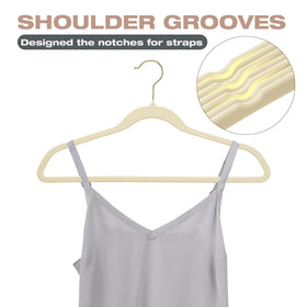Uinicor curved-shoulder velvet hanger preserves garment silhouette