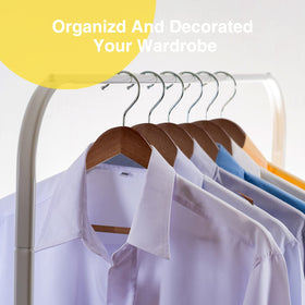UINICOR wooden hangers illustrating space-saving design for closets.