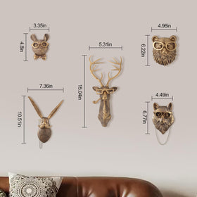 UITWMKTG bear head wall decor in gold creates a bold focal point.
