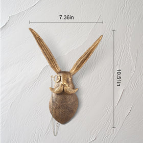 UITWMKTG gold deer head antlers creates a bold focal point in offices.
