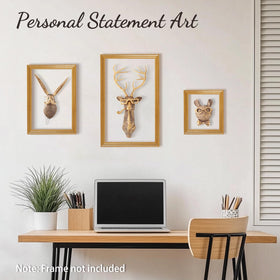 UITWMKTG gold rabbit head with glasses highlights quirky desk decor.