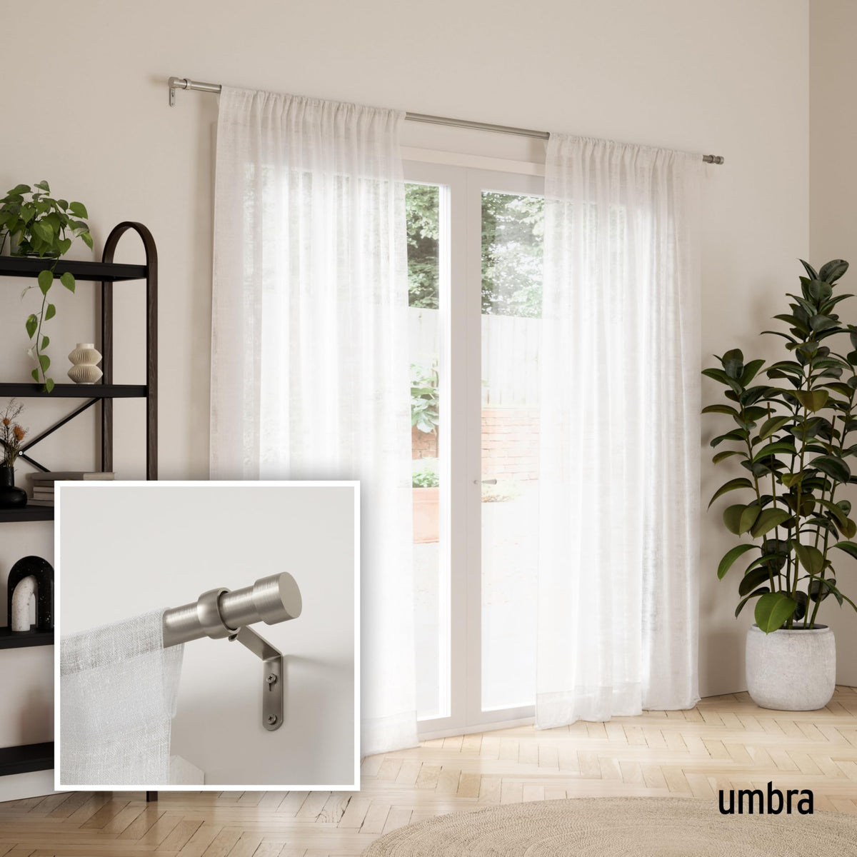 Close-up of Umbra Cappa finials highlighting modern design.