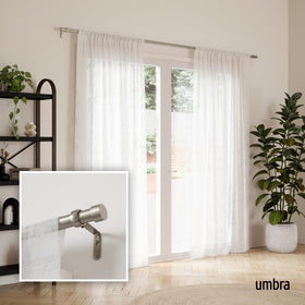 Close-up of Umbra Cappa finials highlighting modern design.