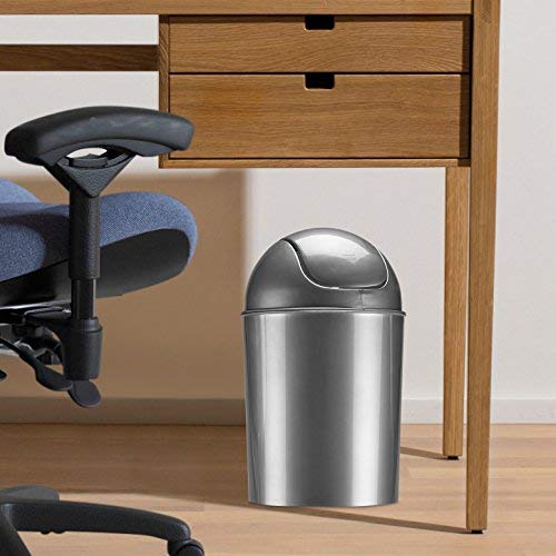 Umbra compact trash bin silver under-table design saves space.