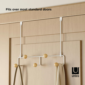 Umbra Estique fits doors up to 1.5 inches thick.