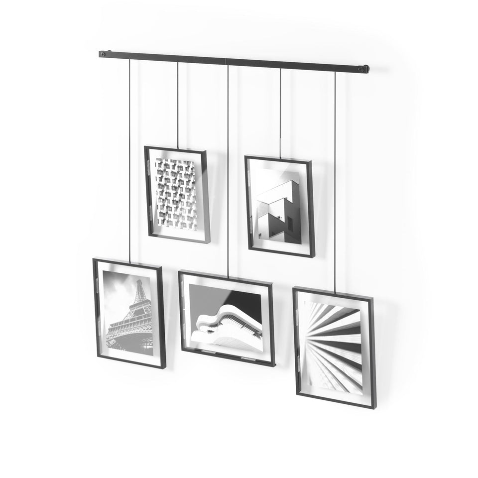 Umbra Exhibit beam with five frames creates a modern wall display.
