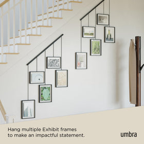 Umbra Exhibit swappable photos enable quick seasonal refreshes.