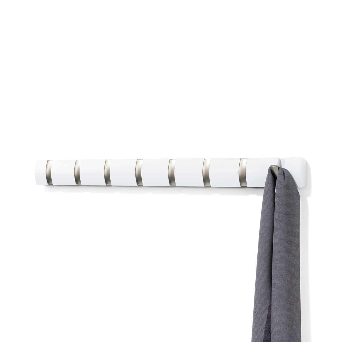 Umbra Flip 8-hook wall rack for space-saving coat storage.