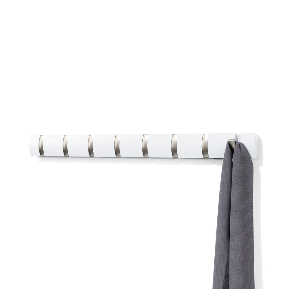 Umbra Flip 8-hook wall rack for space-saving coat storage.