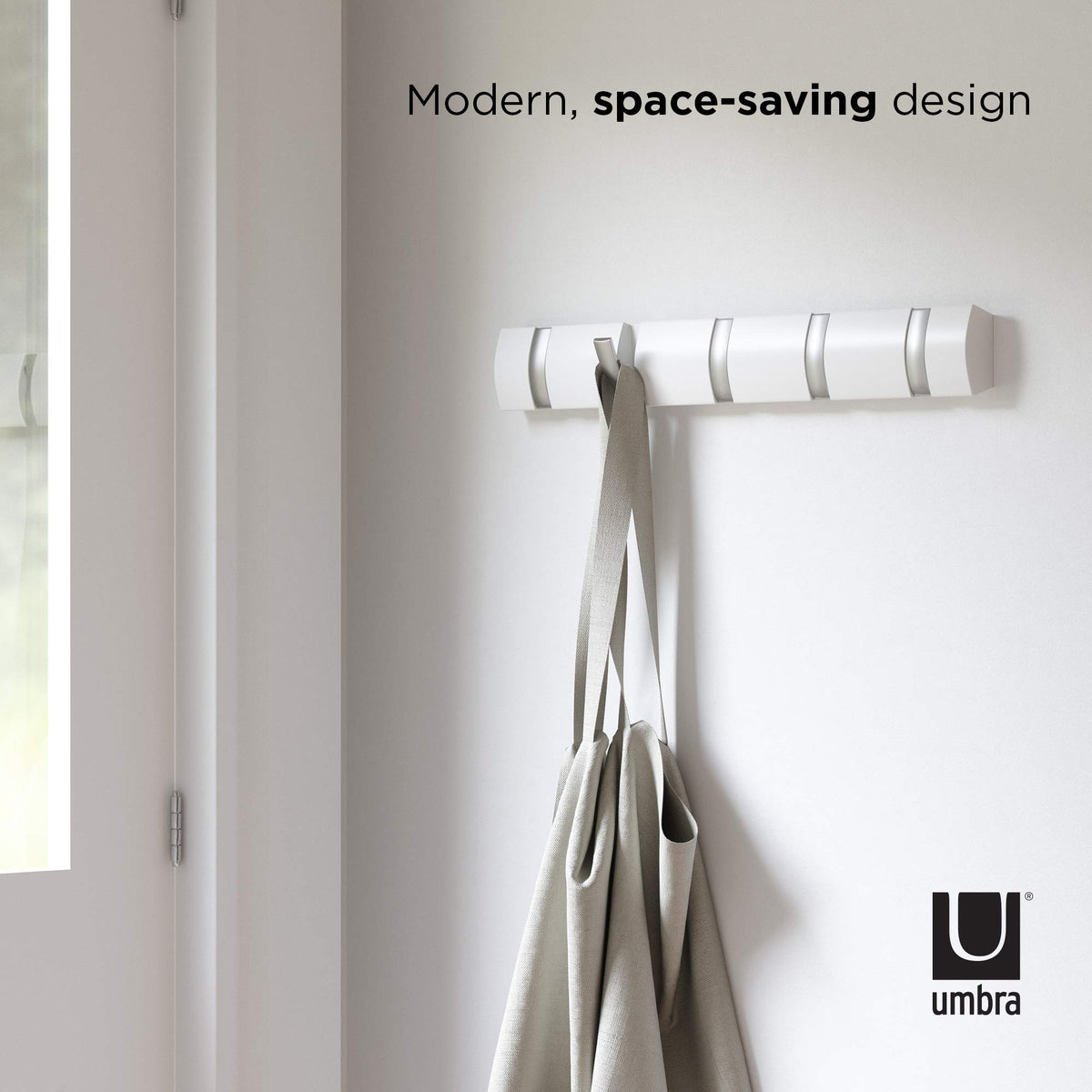 Umbra Flip mounted in a bathroom for towels and robes.