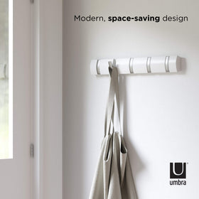 Umbra Flip mounted in a bathroom for towels and robes.
