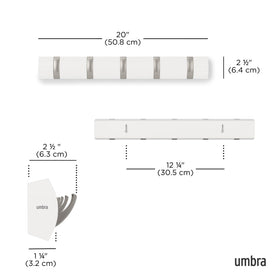 Umbra Flip mounted in an entryway holding coats and bags.