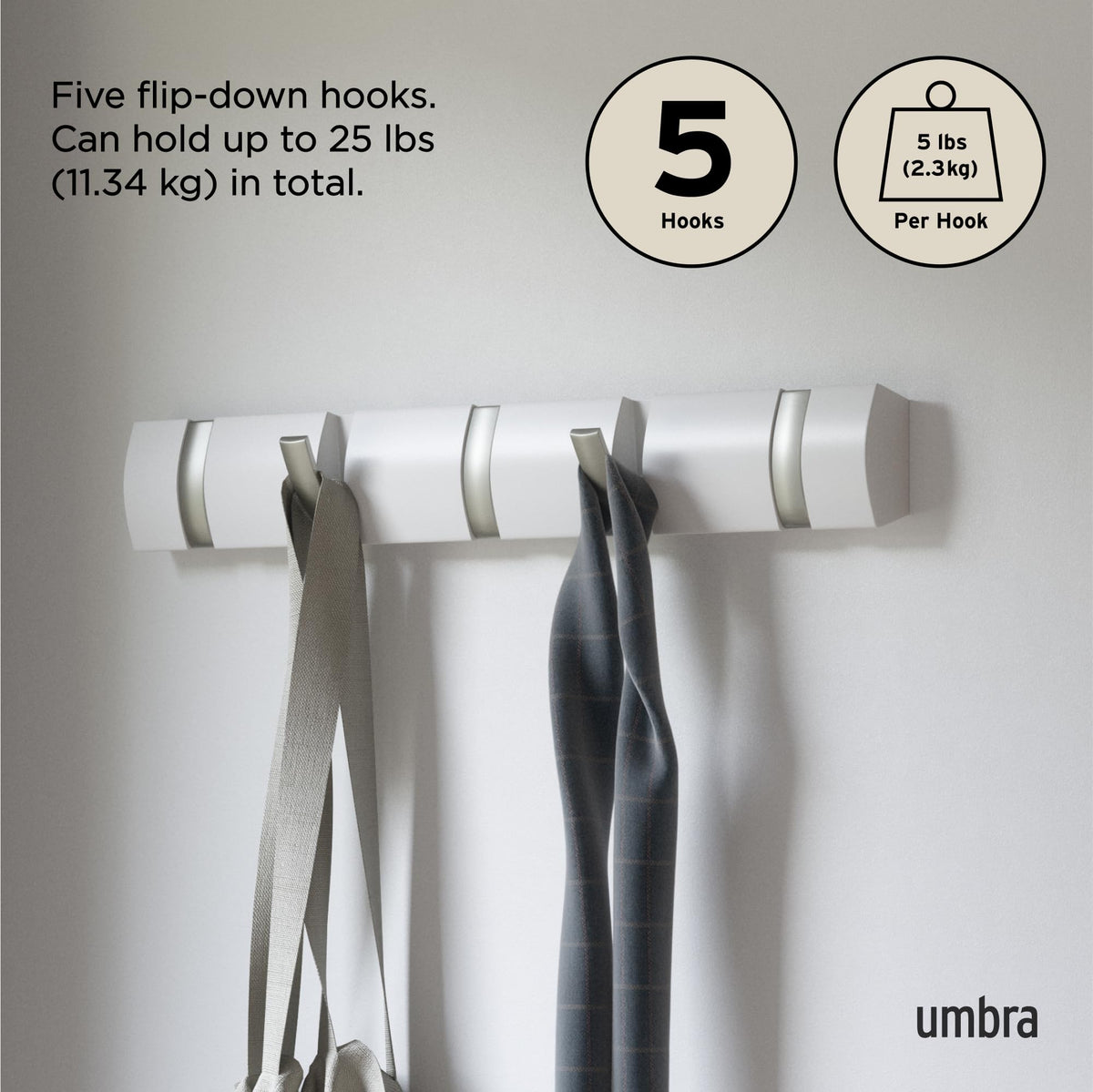 Umbra Flip five-hook rail fits compact spaces for diverse items.