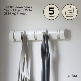 Umbra Flip five-hook rail fits compact spaces for diverse items.