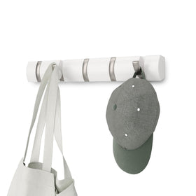 Umbra Flip wall-mounted coat rack with five retractable hooks for space-saving entryways.