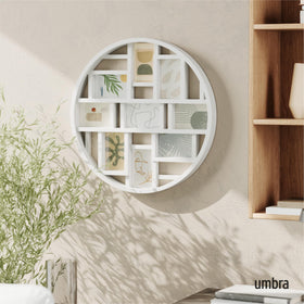 Umbra Luna showcases nine 4x6 pictures in a modern white frame.