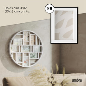 A white, contemporary Umbra Luna frame complements any room decor.