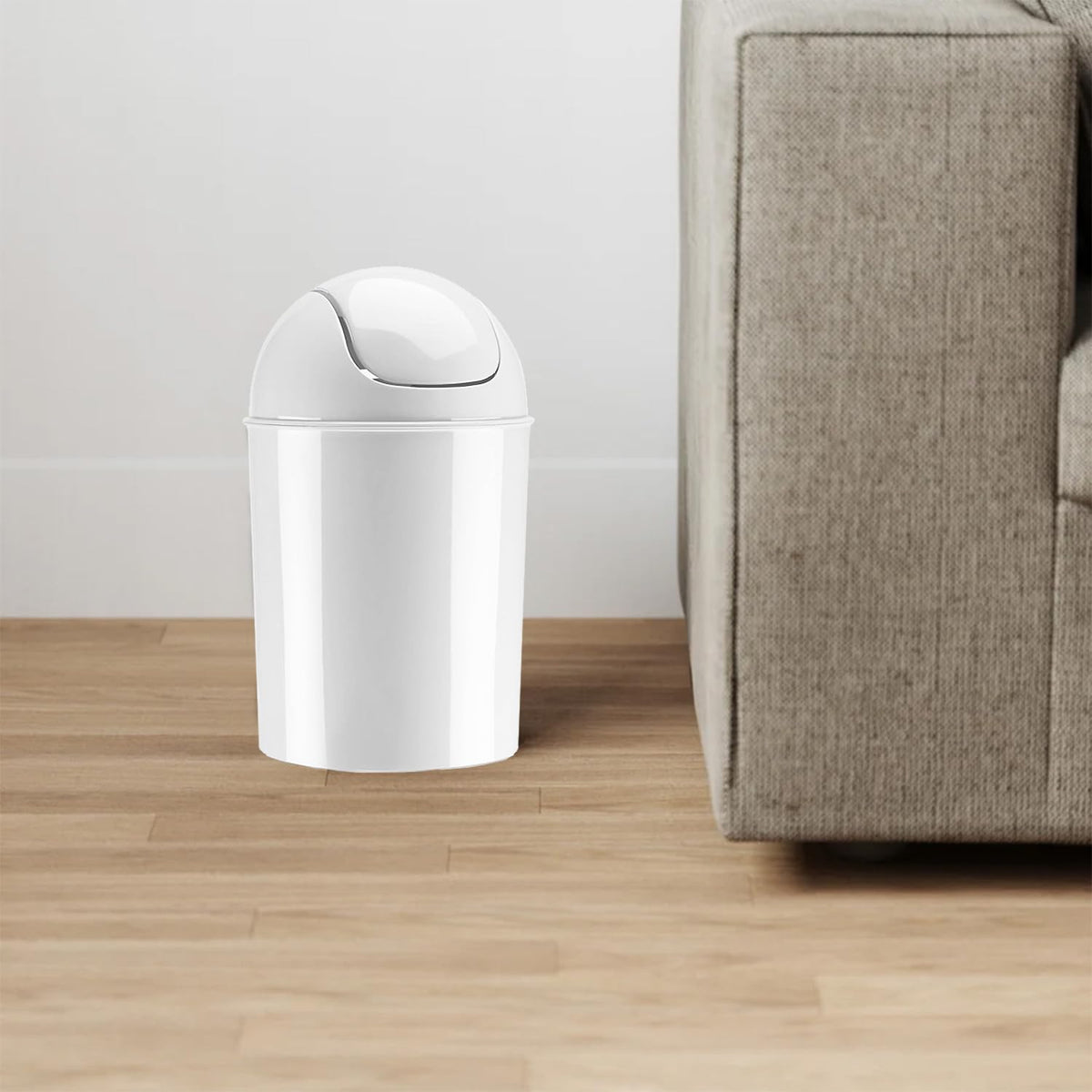 Umbra Mini white waste can in office setup with clean lines