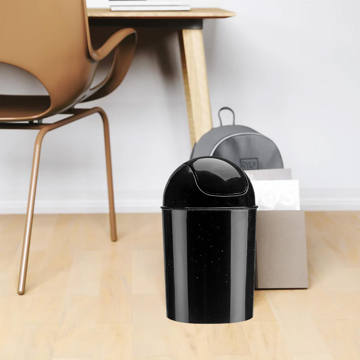 Umbra mini waste can easy to wipe clean.