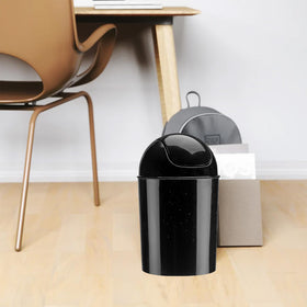 Umbra mini waste can easy to wipe clean.