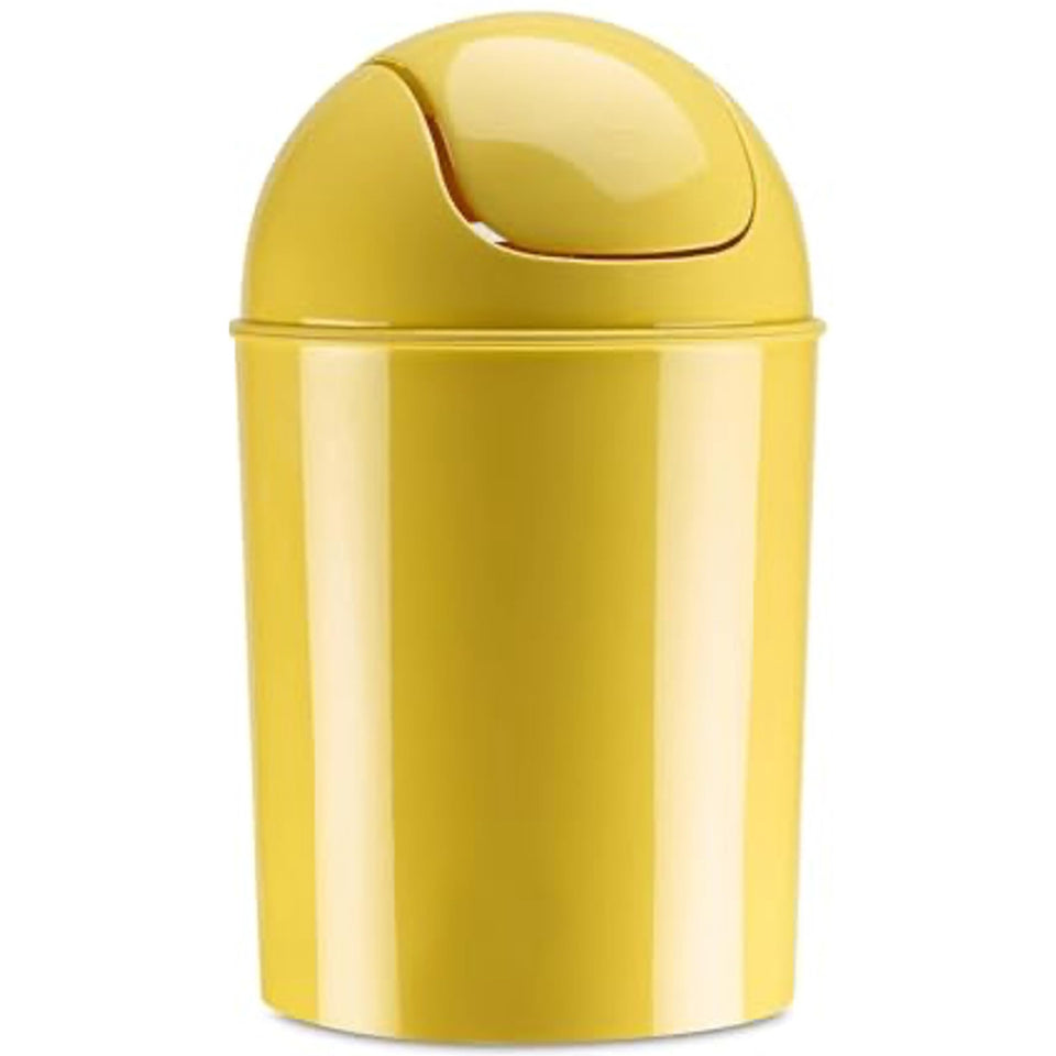 Umbra mini waste can with swing-top lid in yellow for discreet trash concealment.