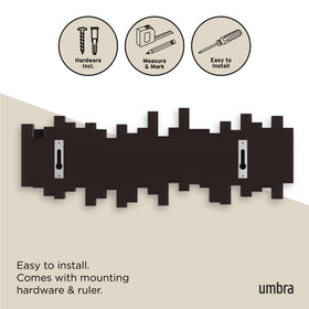 Umbra Sticks bedroom organizer helps hang robes, hats, and more.