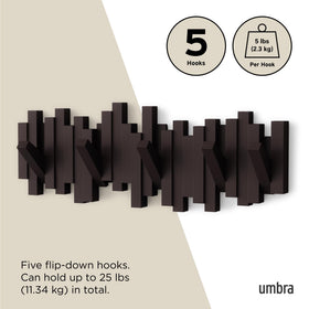 Umbra Sticks entryway storage keeps jackets and scarves neatly tucked away.