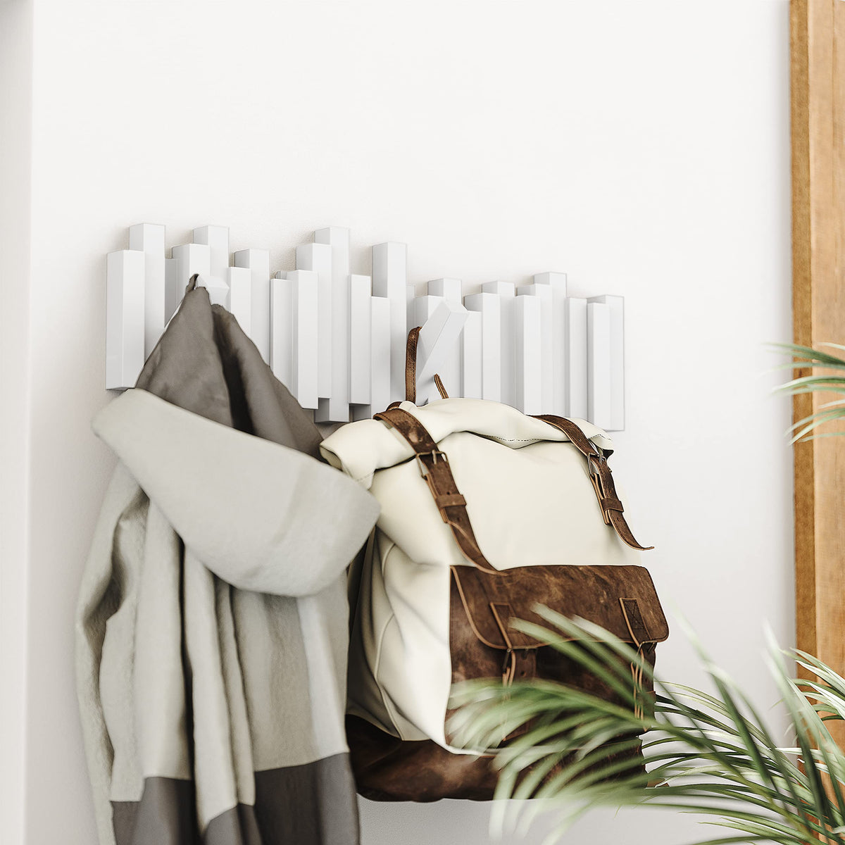 Umbra Sticks lightweight white finish complements modern interiors