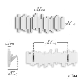 Umbra Sticks installation on wall shows quick setup with included hardware