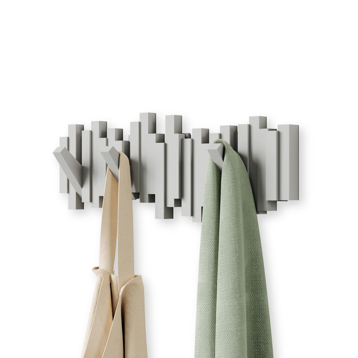 Umbra Sticks wall-mount coat rack with five retractable pegs for organized entryway storage