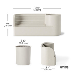 Umbra Stream integrated planter space in a tidy desk setup.